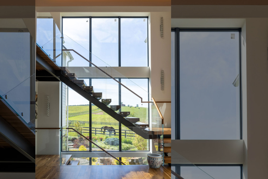 modern-floating-staircase-rich-wood-tones-wall-windows-1100x733.jpg