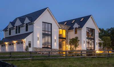 Nightview of luxury estate horse farm home in Maryland designed by 2e Architects