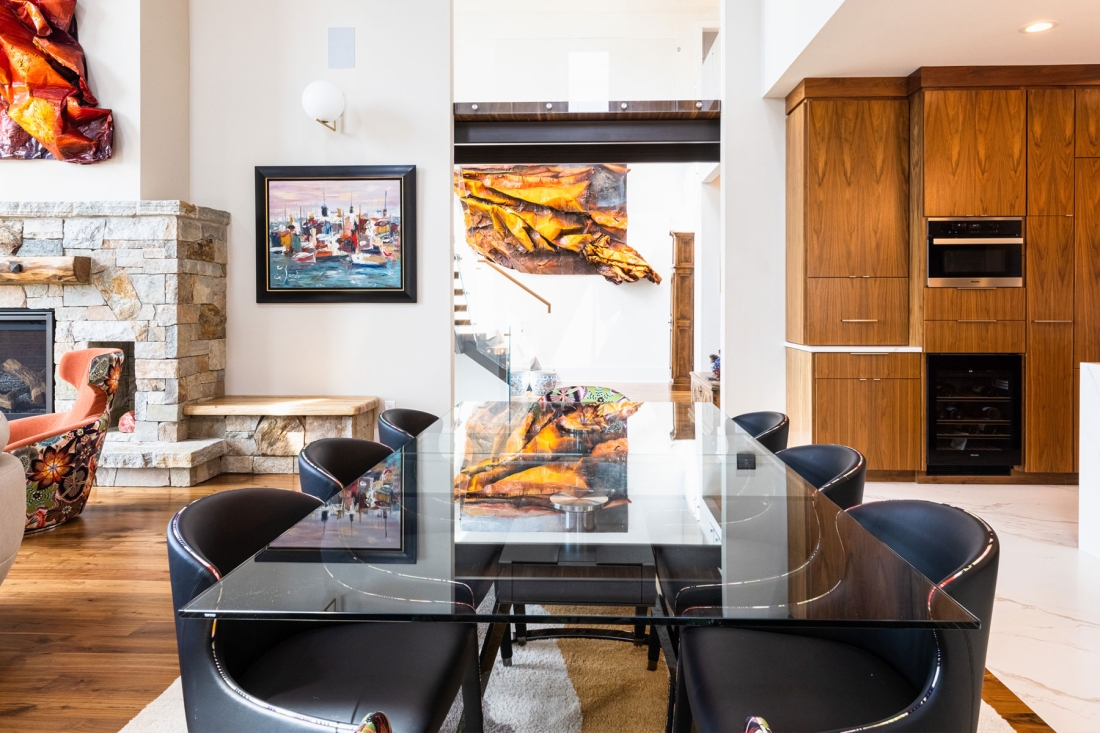 open-dining-room-between-kitchen-living-room-vaulted-ceiling-modern-art-1100x733.jpg