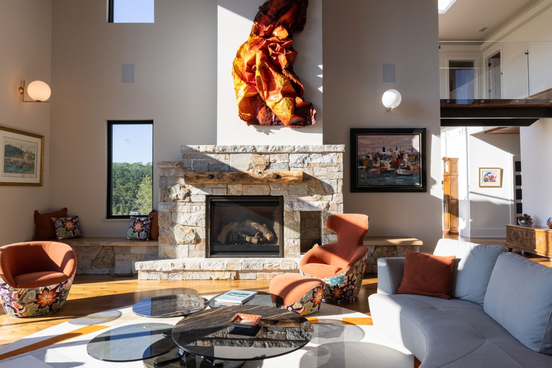 stacked-stone-fireplace-asymmetrical-modern-1100x733.jpg